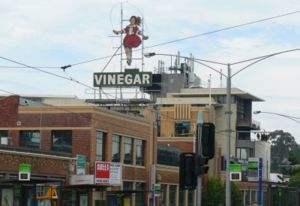 View of the Skipping Girl sign in Victoria streetscape
